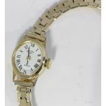 A Rotary 9ct gold lady's wristwatch oval dial with Roman numerals, gold plated bracelet strap