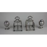 A pair of late Victorian silver toastracks four divisions with central scroll loop handle, maker