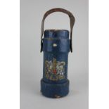 A blue painted canvas shell carrier, with royal standard transfer and leather swing handle 34cm high