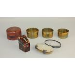 A miniature faux tortoiseshell knife box, a mother of pearl cased oval magnifying glass (a/f) and