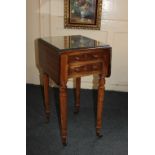 A small 19th century mahogany Pembroke type work table with two drop flaps, two drawers and two