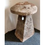 A staddle stone on faceted base height approx 72cm