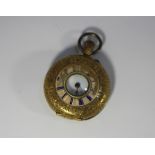 An 18ct gold cased half hunter ladies pocket watch, the white enamel dial with Roman numerals