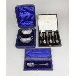 A cased pair Victorian silver two-handled cruets oval fluted design maker Atkin Brothers Sheffield