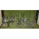 A collection of 19th century and later drinking glasses and other glassware, to include a measure on
