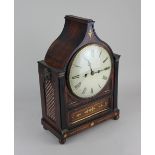 A Regency mahogany and brass inlaid bracket clock the cream enamelled dial with Roman numerals,