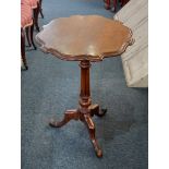 A mahogany wine table the circular scalloped top with moulded edge on tripod base 49cm (a/f)