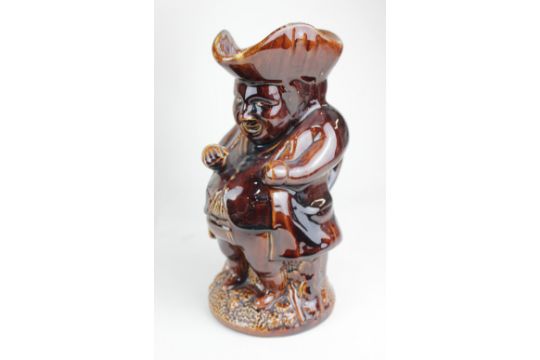 A brown glazed pottery Toby jug, 24cm high, and a polychrome example modelled as an elderly woman - Image 2 of 2