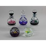 A collection of Caithness Royal Commemorative glass comprising three perfume bottles; Golden