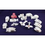 A collection of crested china model tanks, trucks, aeroplanes and battleships to include W & R