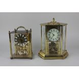 A West German Kundo anniversary mantle clock, 21cm high, with key, together with a similar style