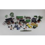 A collection of model toys mostly die-cast and lead, to include farm animals and machinery, motor