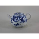 A Chinese Export porcelain blue and white teapot and strainer with floral decoration