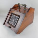 A Victorian carved mahogany coal scuttle, with liner and brass carry handle