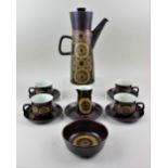 A Denby Arabesque part coffee service comprising coffee pot, milk jug, sugar bowl, four tea cups and