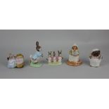 Four Royal Albert Beatrix Potter porcelain figures including Peter Rabbit and Hunca Munca, two boxed