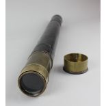 A brass and leather single drawer telescope (a/f)