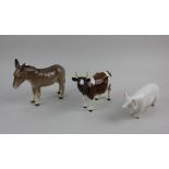 A Beswick model Ch Ickham Bessie Ayrshire cow 11.5cm high, Ch Wal Boy pig 7cm high, and a donkey