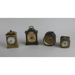 Four small clocks to include an Astral miniature brass mantle clock 10cm high and a Swiza