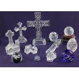 A collection of Waterford and other crystal paperweights and ornaments to include three crucifixes