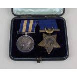 A Campaign medal pair comprising an Egypt 1882 Campaign medal awarded to 33 P PTE E J RUSSELL AFO