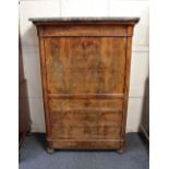 A French secretaire a abattant fall front desk with marble top and frieze drawer above flame front