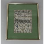 A framed needlework sampler by A Laxton with alphabet and verse 'O may these early pious cares ...',