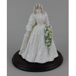 A Coalport porcelain limited edition bridal figure of Princess Diana, 8530 / 12500, 23cm high, on