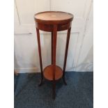 An Edwardian inlaid mahogany plant stand with circular top and platform stretcher, 30cm