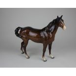 A Beswick model of a horse in brown gloss 21.5cm high