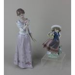 Two Lladro porcelain figures of a woman holding a flower 'A Grandmother's Love' 30cm high, and a