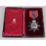 A George V Imperial Service Medal awarded to Edward J Russell, cased