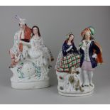 Two large Staffordshire pottery flatback figure groups, one with a painted clock dial 35cm high (a/