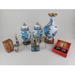 A Chinese glass perfume bottle with reverse painted decoration and jade coloured stopper, boxed,