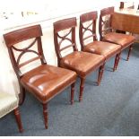 A set of four 19th century dining chairs with X framed backs, stuff over seats on turned tapered