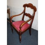 A Victorian carver dining chair with wavy bar back and top rail on turned baluster legs (a/f)