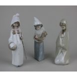 Three Lladro porcelain figures of a woman and child 20cm high, a girl holding a chicken 19.5cm high,