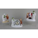 Three Coalport porcelain 'The Snowman' figure groups comprising a mantle clock 13.5cm high, a