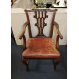 A Chippendale style carver dining chair with scroll carved top rail and lattice pierced back,