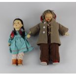 A mid 20th century Krahmer Puppen doll with carved wooden head and original outfit including