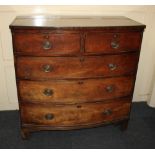 A 19th century mahogany bowfront chest of two short over three long graduated drawers on bracket