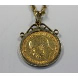 A 1911 half sovereign in 9ct gold pendant mount, on a 9ct gold neck chain 11.5g gross weight