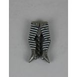 A German novelty ladies legs small pocket corkscrew blue and white sriped stockings, bladed worm
