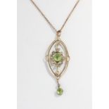 A 9ct gold peridot and pearl pendant, on a 9ct gold chain, with extender, length 40-47cm, gross