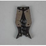 A German novelty ladies legs pocket corkscrew with brown and cream striped stockings, 67mm