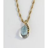 A topaz and diamond pendant, set in 9ct gold, on a 9ct gold rope twist chain, length 54cm, gross