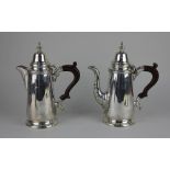 A pair of modern silver cafe au lait pots in Queen Anne style with domed lids and finials, maker