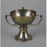 A George V silver three handled trophy chalice with presentation inscription, maker Walker and Hall,