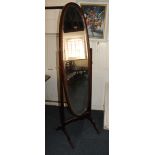An Edwardian mahogany inlaid oval cheval mirror on four splayed legs mirror plate 141cm by 38cm