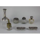 An Edward VII silver topped glass dressing table bottle pair of silver topped rectangular glass